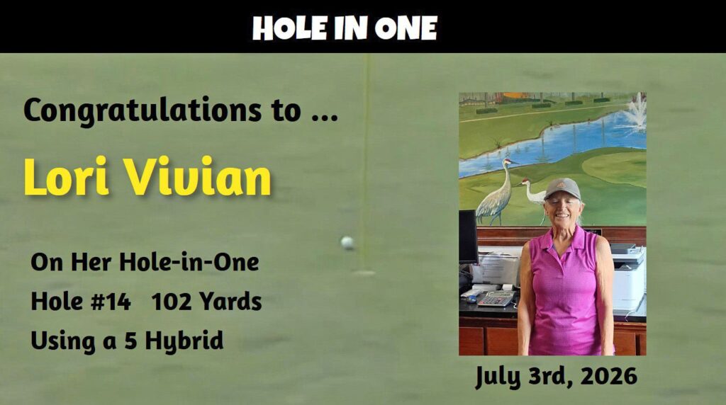 Lori Vivian smiling in the pro shop after her hole-in-one on Hole 14