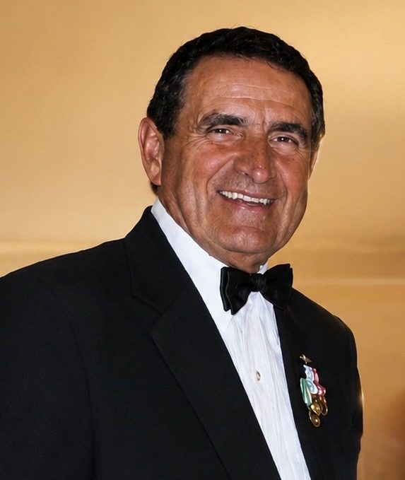 John Muskovac in a tuxedo wearing his Navy service medals