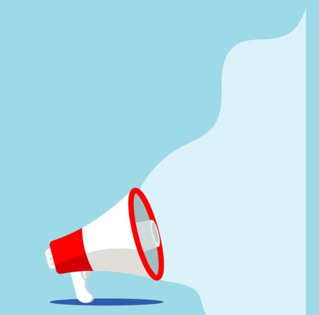 Red megaphone on a light blue background for Shout It Out